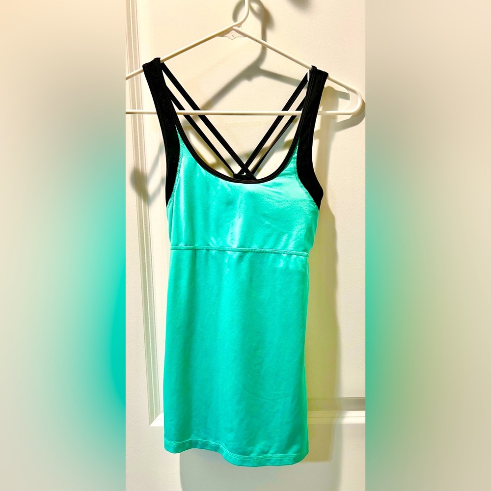 Women’s breathable cross cross back workout tank. Gently used.